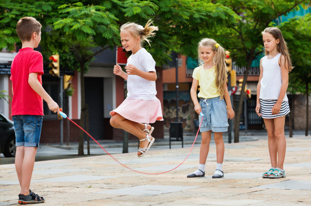 Children playing with skipping rope