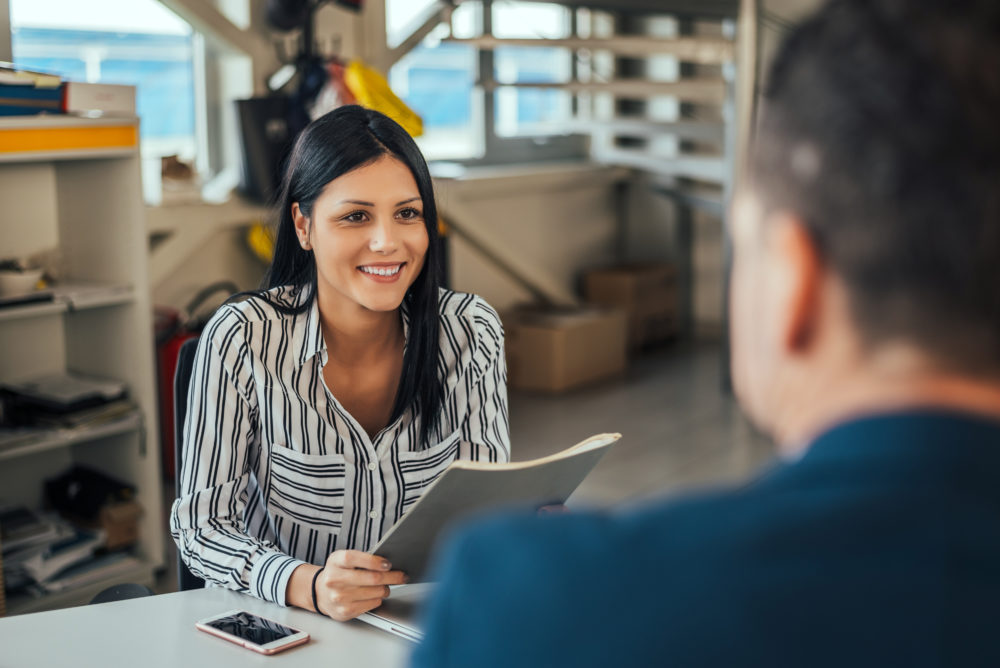 Woman presenting document